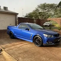 Blue ute outside after a detail
