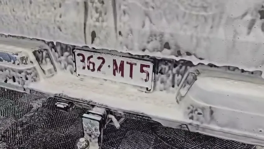 Touchless shake and bake wash foam on a vehicle